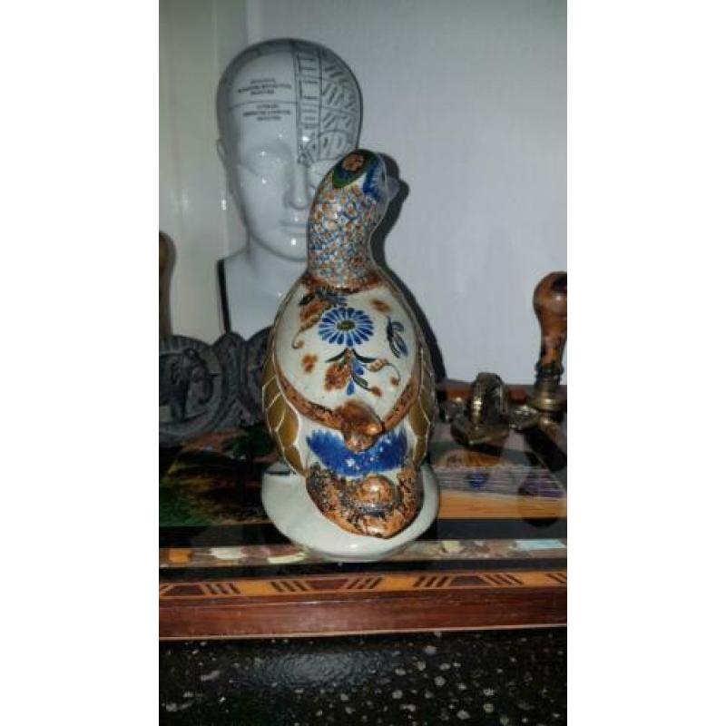 Vintage beeld eend, vintage sculptuur van een eend