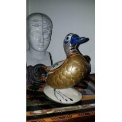 Vintage beeld eend, vintage sculptuur van een eend