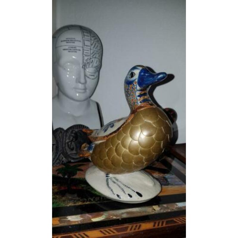 Vintage beeld eend, vintage sculptuur van een eend