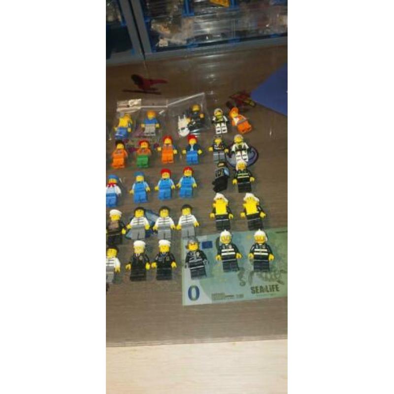 Lego 69 minifigures (City, Space, Ferrari, Racers, Miners)