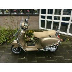 vespa lx touring snor scooter