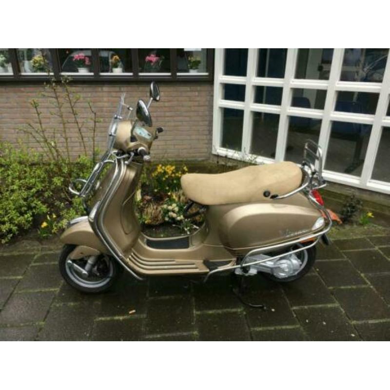 vespa lx touring snor scooter